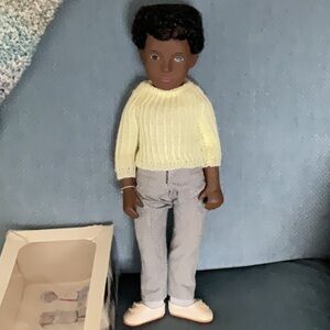 Sasha Doll with Yellow Sweater and Gray Pants.
